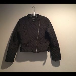 Cropped studio si black woman’s jacket